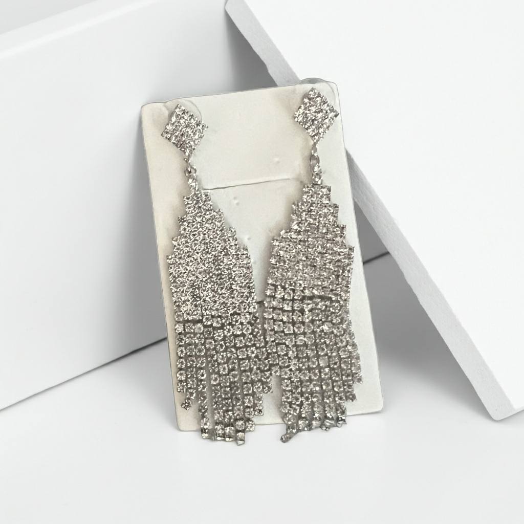 Clear rhinestone chandelier fringe statement earrings in silver-tone with graduated strands