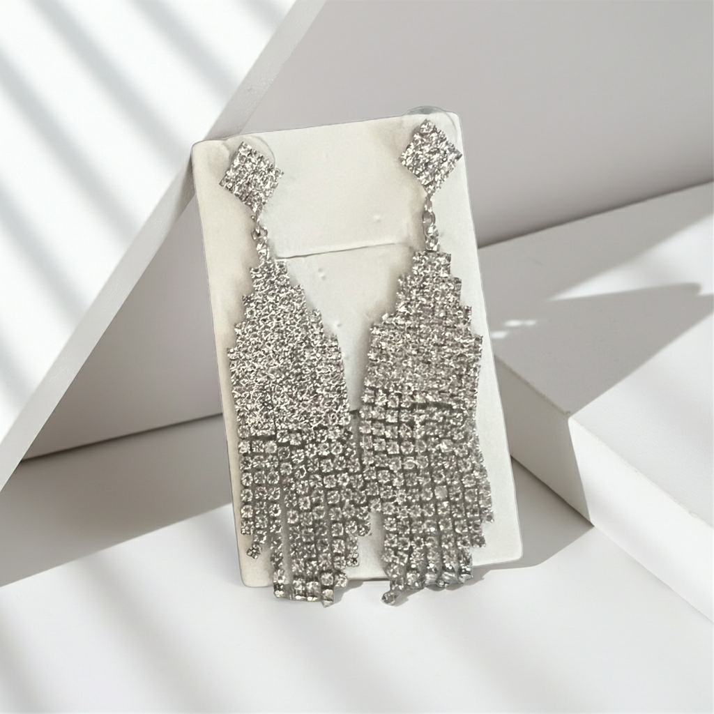 Clear rhinestone chandelier fringe statement earrings in silver-tone with graduated strands, alternate view