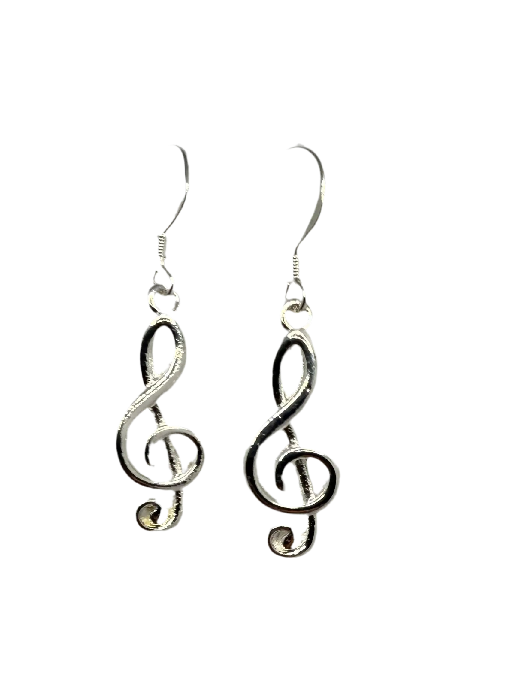 Silver-tone treble clef dangle earrings on French hook ear wires, alternate view