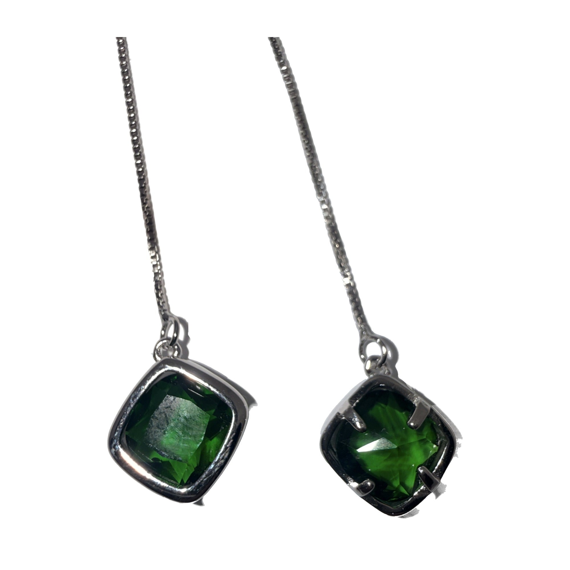 Silver-tone chain threader earrings with green stone drops, close angled view