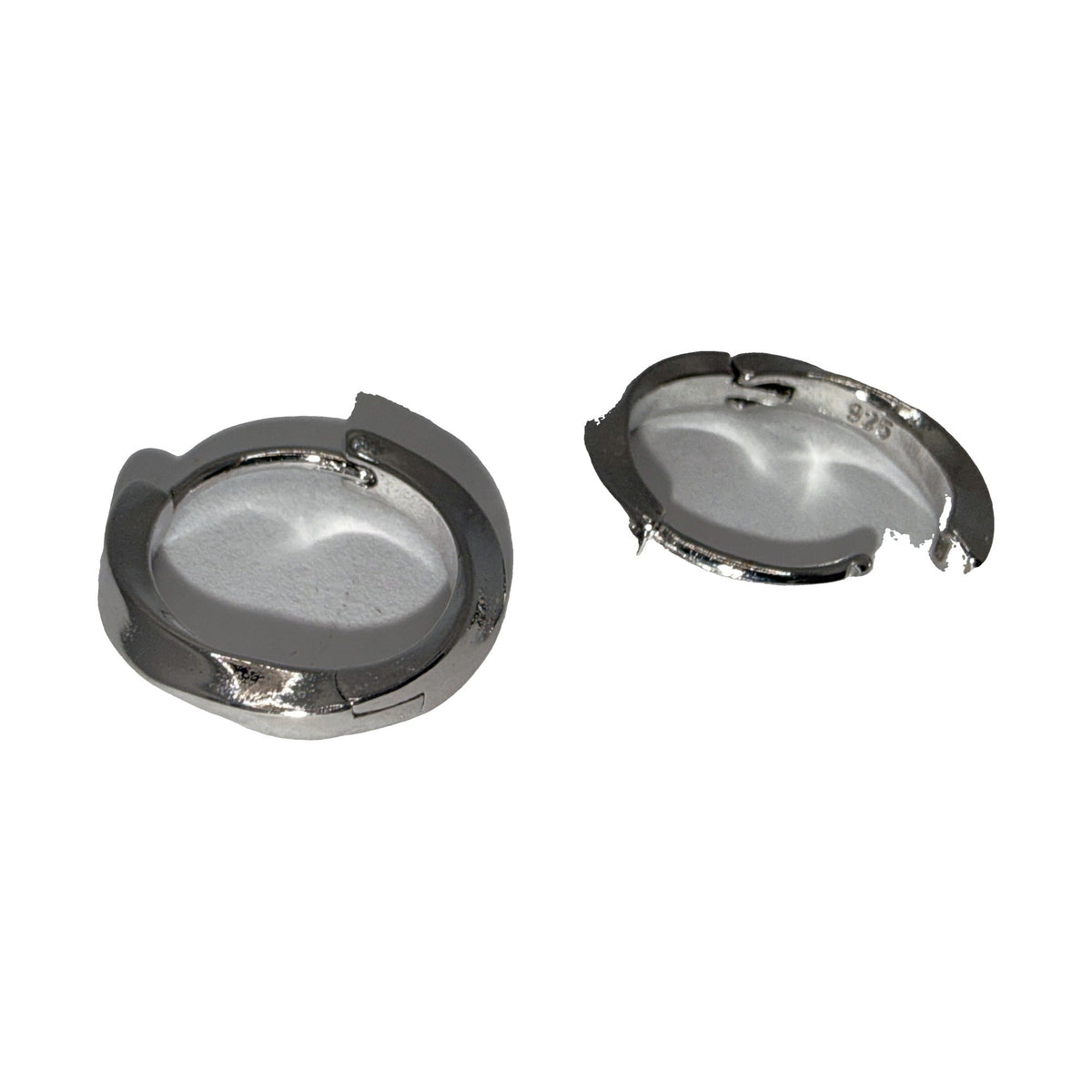 Polished silver-tone wide band huggie hoop earrings, angled view
