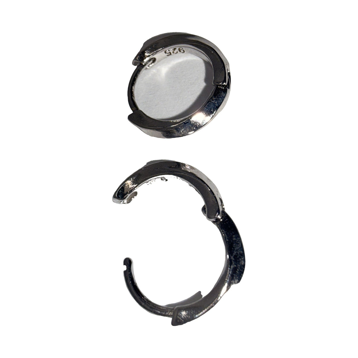 Small polished silver-tone slim huggie hoop earrings, angled view