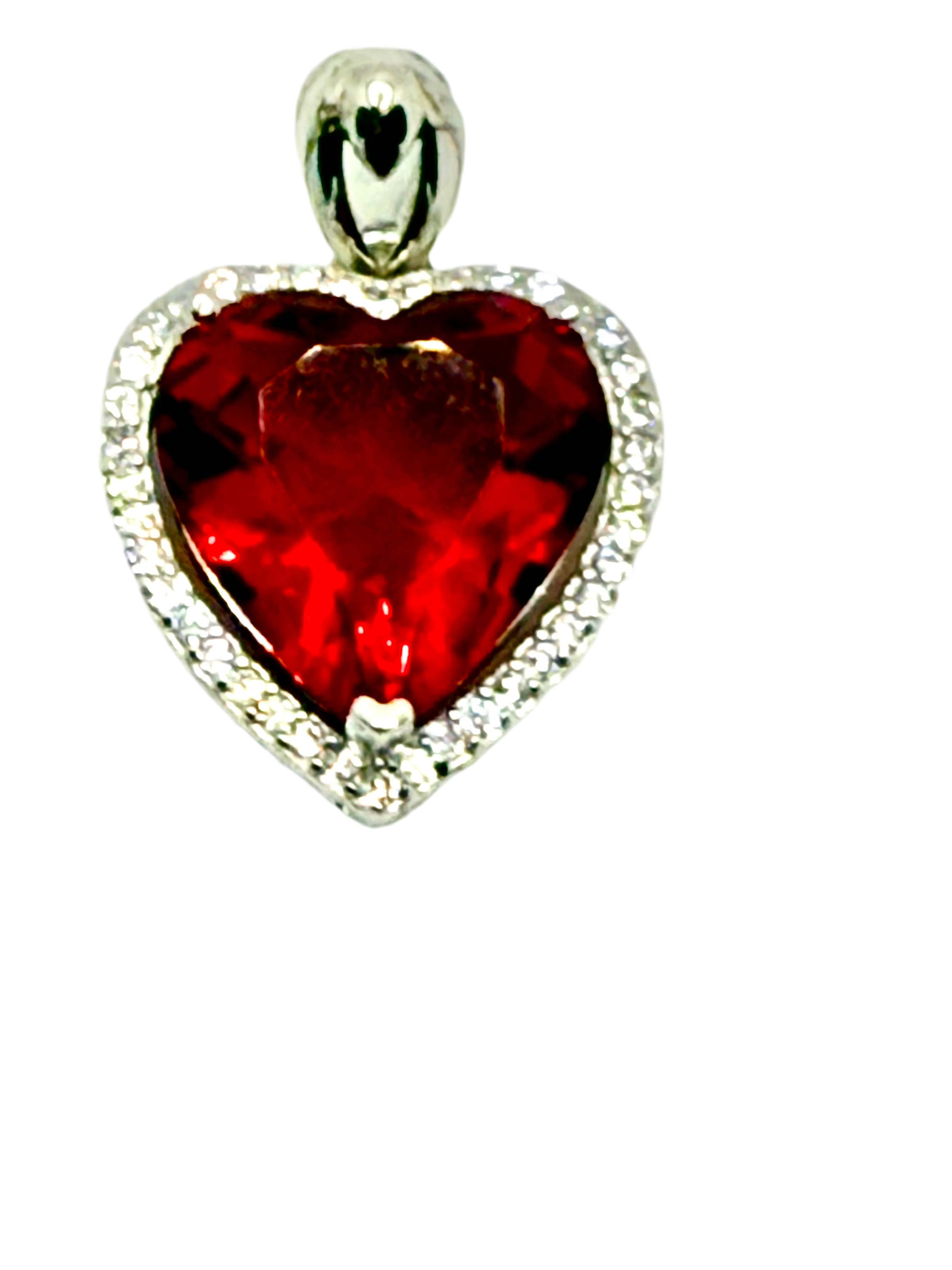 Stimulated ruby heart pendent