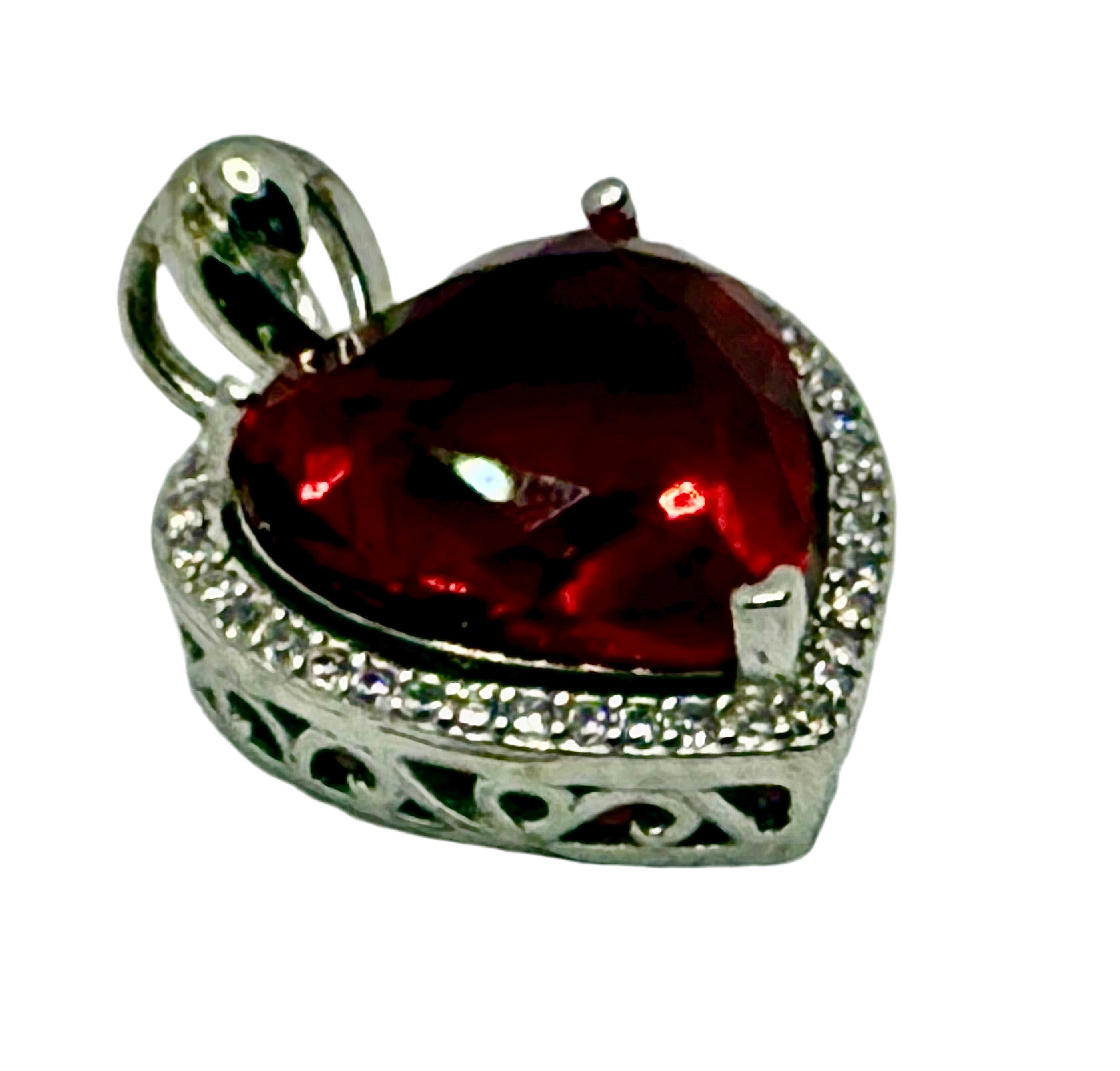 Stimulated ruby heart pendent