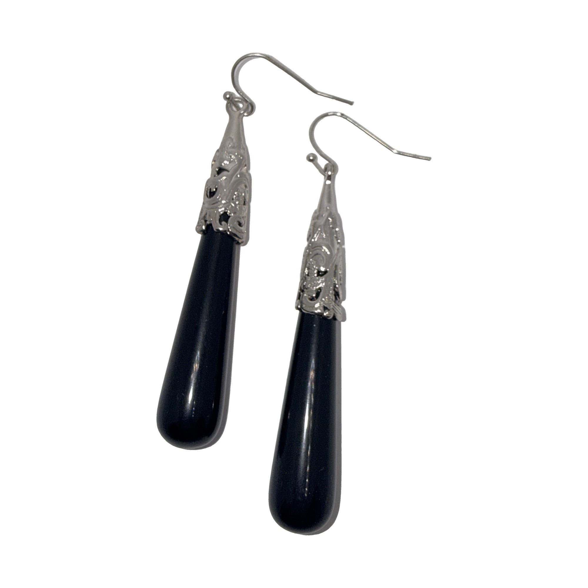 Silver-tone long black teardrop earrings with filigree caps, angled view