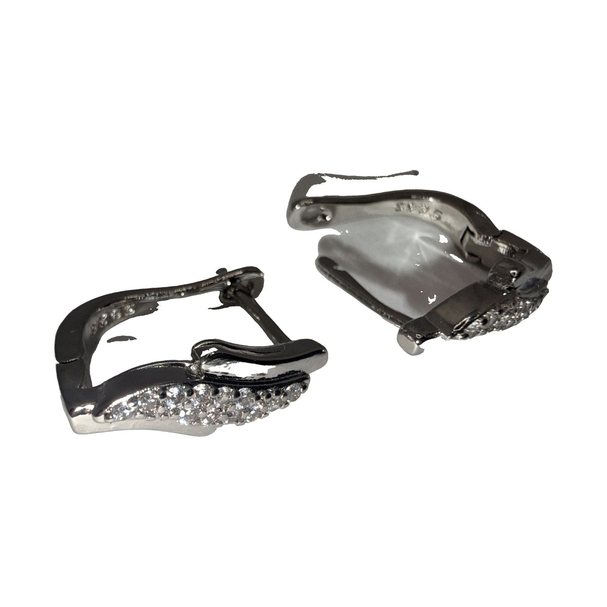 Silver-tone wave huggie earrings with clear rhinestone pave and hinged lever backs