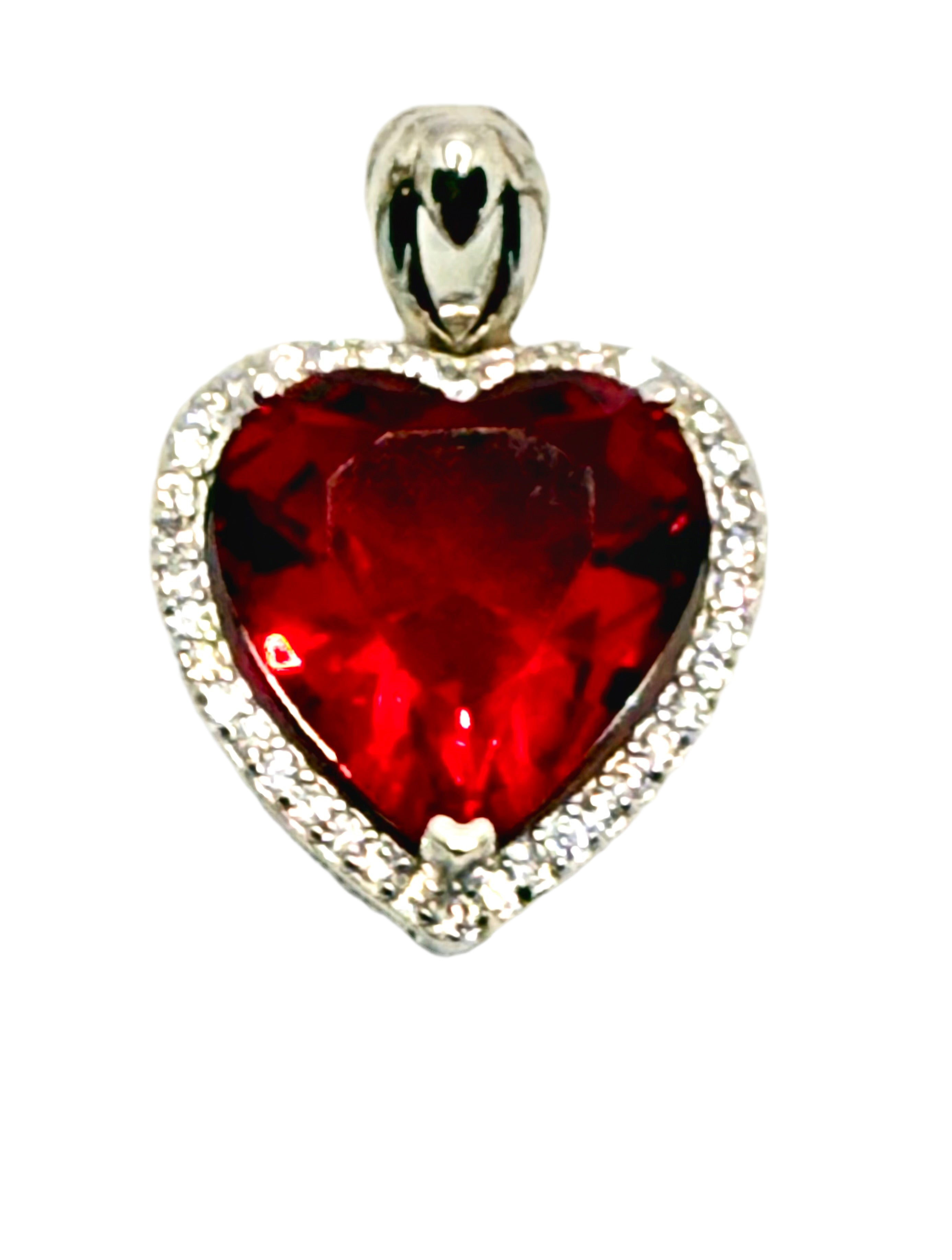 Stimulated ruby heart pendent