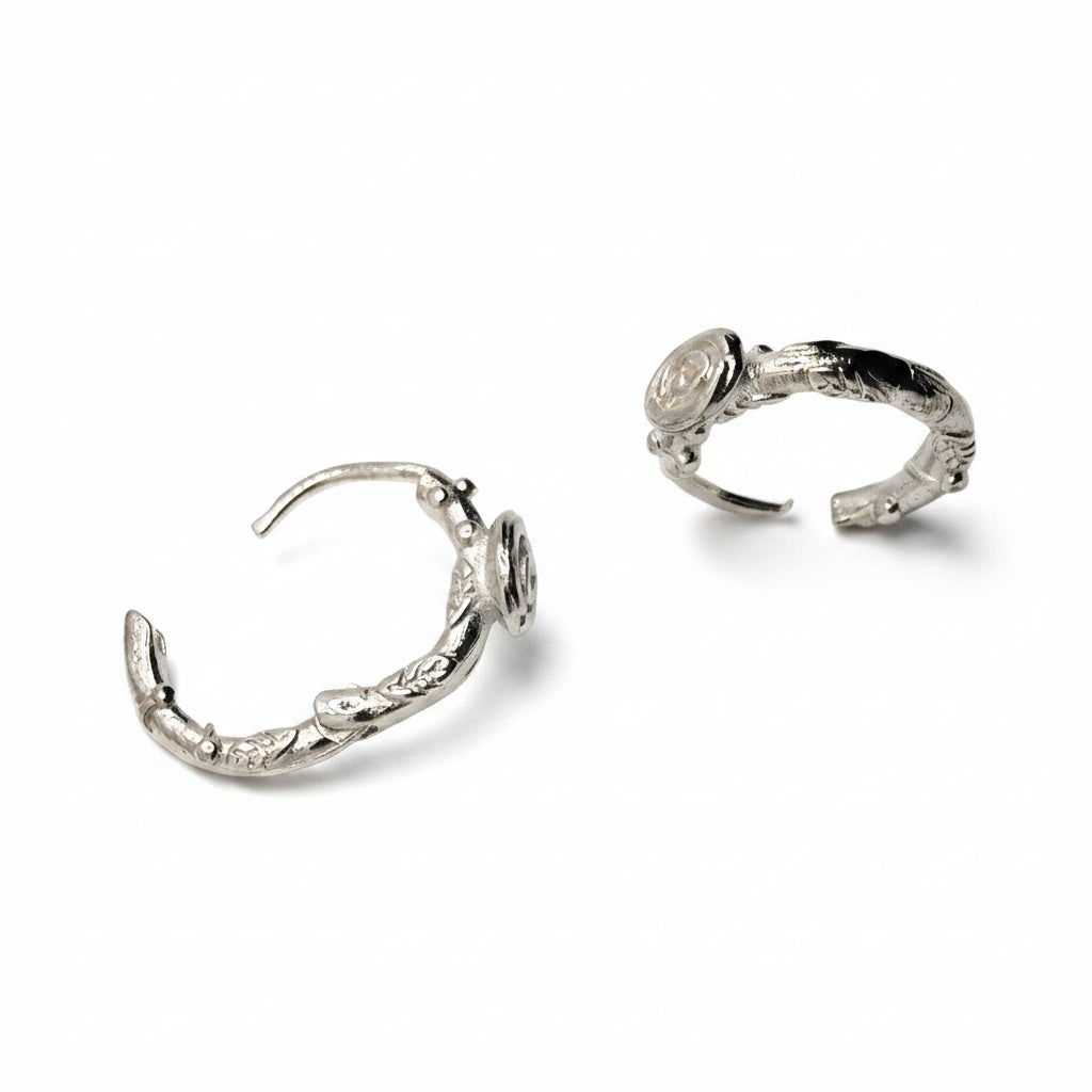 Metal Tone Swirl Spiral Small Drop Earrings on a plain white background